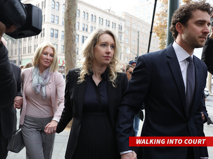 elizabeth holmes walking to court